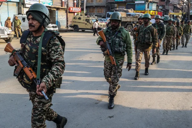 India and Pakistan exchange gunfire as tensions