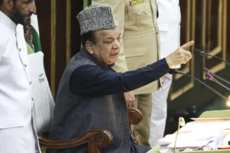 Officials discuss the controversial J&K tourism consultant appointment at a government meeting in Srinagar.