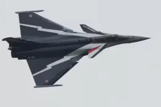 Indian Navy officers review Rafale M fighter jet details as part of the Rafale M deal for Indian Navy.